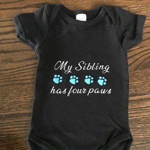 My sibling has 4 paws onsie